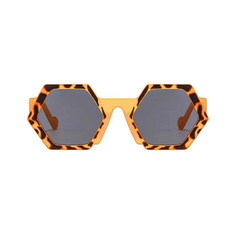 Trend-forward hexagonal frame sunglasses with bold, tortoiseshell patterns in orange and brown feature dark, tinted lenses and UV400 protection, all displayed against a white background.