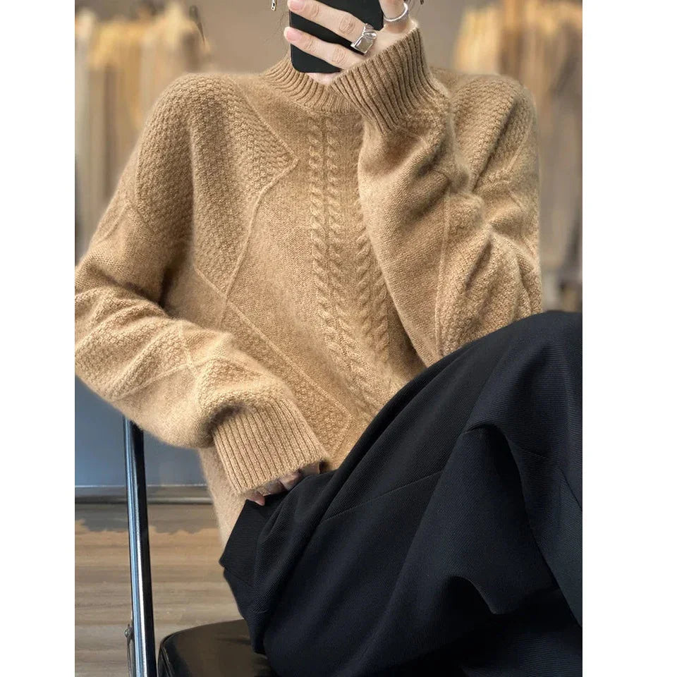 Rovelli beige cable knit sweater with ribbed cuffs, styled with black pants
