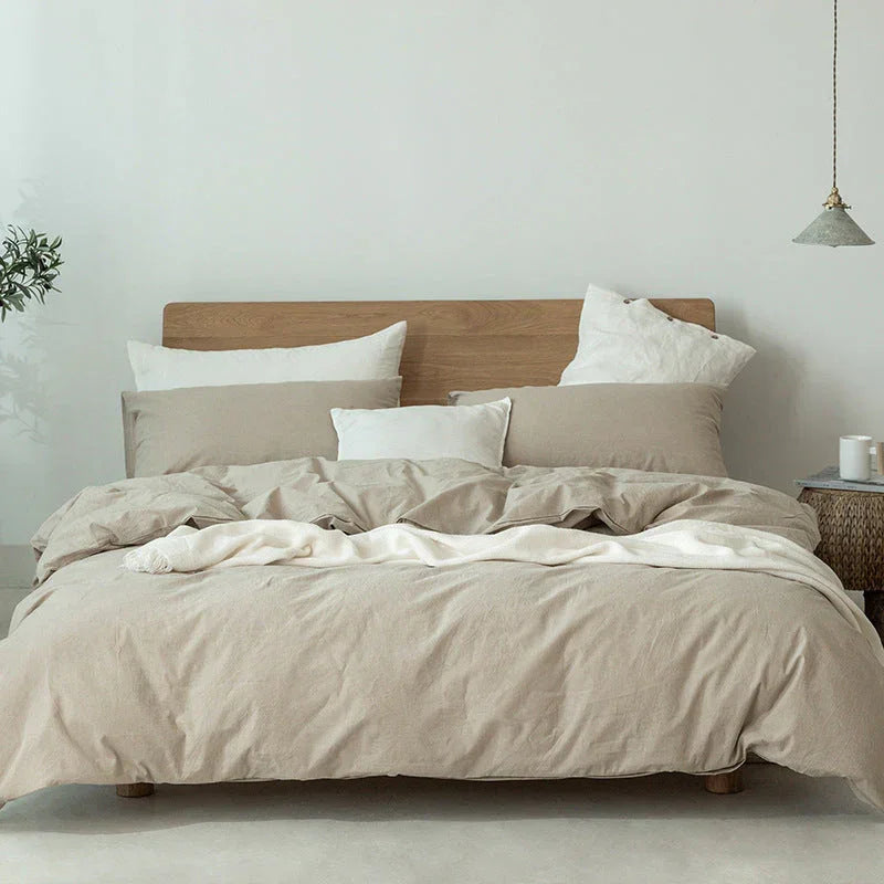 Minimalist beige bedding set on wooden bed frame in modern Rovelli bedroom