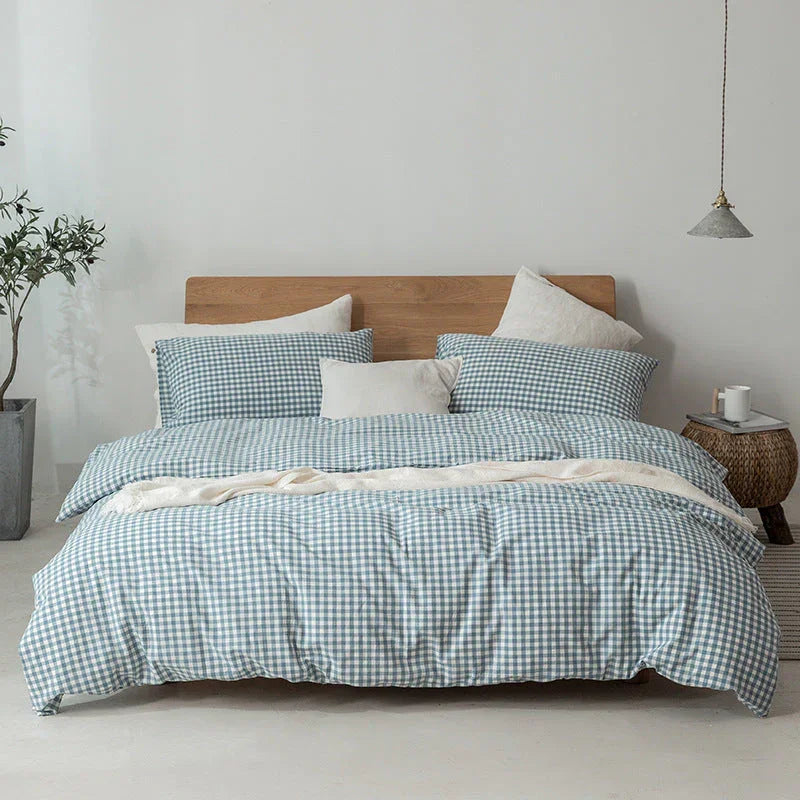 Rovelli modern bedroom with blue gingham bedding, minimalist decor, wooden bed frame