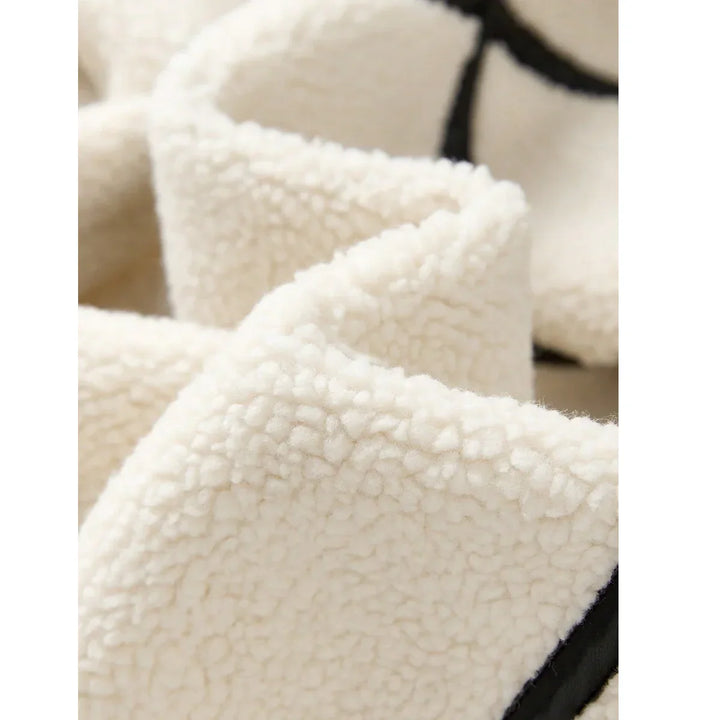 Rovelli cream sherpa fleece fabric with black accent detail, soft texture close-up