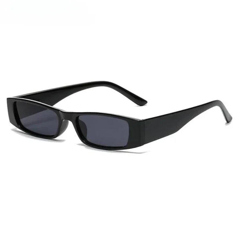 A pair of black retro rectangle sunglasses with thick, lightweight frames and dark lenses offering UV400 protection, displayed on a white background.