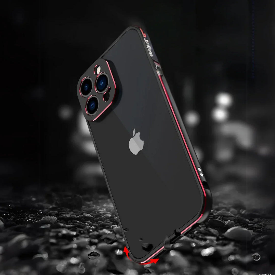 A black iPhone with a durable phone case in red and black stands upright on a wet, reflective surface, with blurred lights illuminating the dark background.