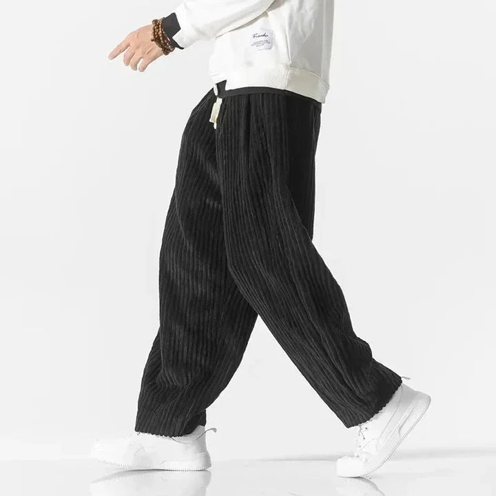 Rovelli relaxed fit black corduroy pants with drawstring, styled with white sneakers