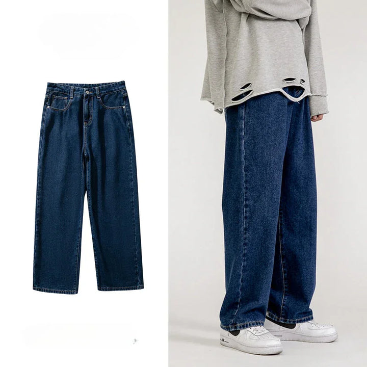 Two images: on the left, a pair of men’s baggy jeans with a wide-leg design displayed flat; on the right, a person styling the same Korean fashion jeans with a gray distressed sweater and white sneakers.