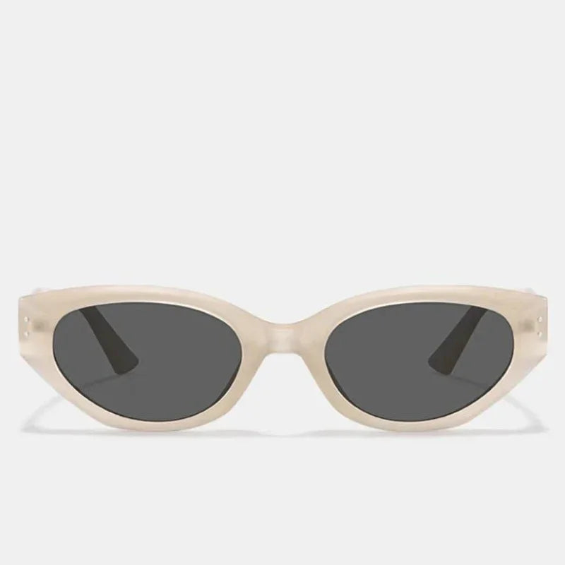 A pair of sunglasses with thick, cream-colored oval frames crafted from translucent acetate and dark UV400 protection lenses, displayed against a plain light background.