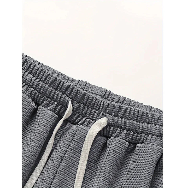 Rovelli gray waffle knit shorts with elastic waistband and white drawstring