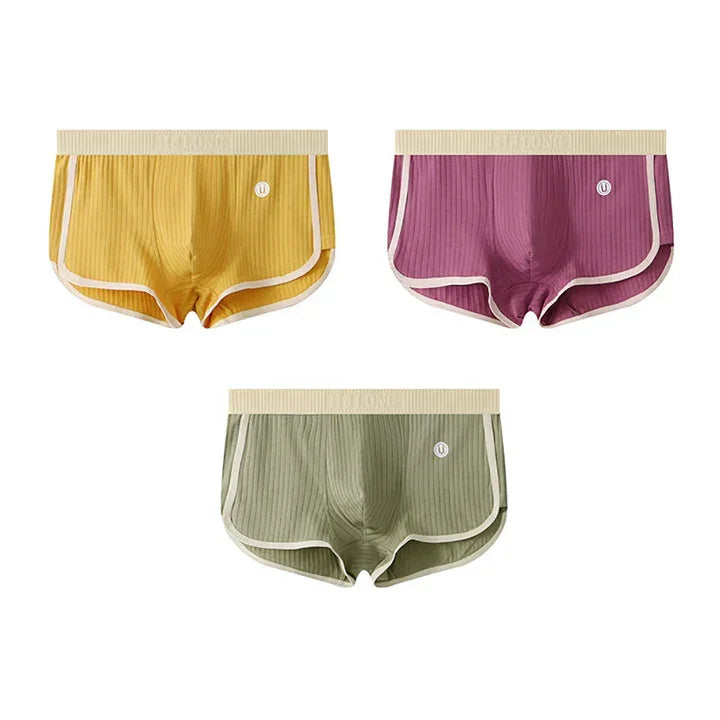 Rovelli ribbed shorts in yellow, purple, and green with white trim, displayed on white background