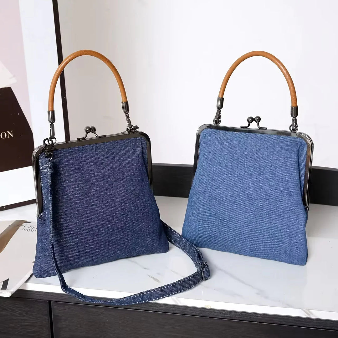 Rovelli denim handbags with wooden handles on white marble surface
