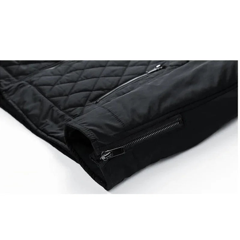 A close-up view of a black, wind-resistant quilted jacket sleeve with a visible zipper on the cuff and another zipper pocket above it, displayed on a white background.
