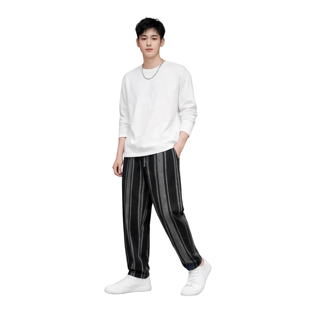 Man wearing white long sleeve shirt and black striped pants from Rovelli