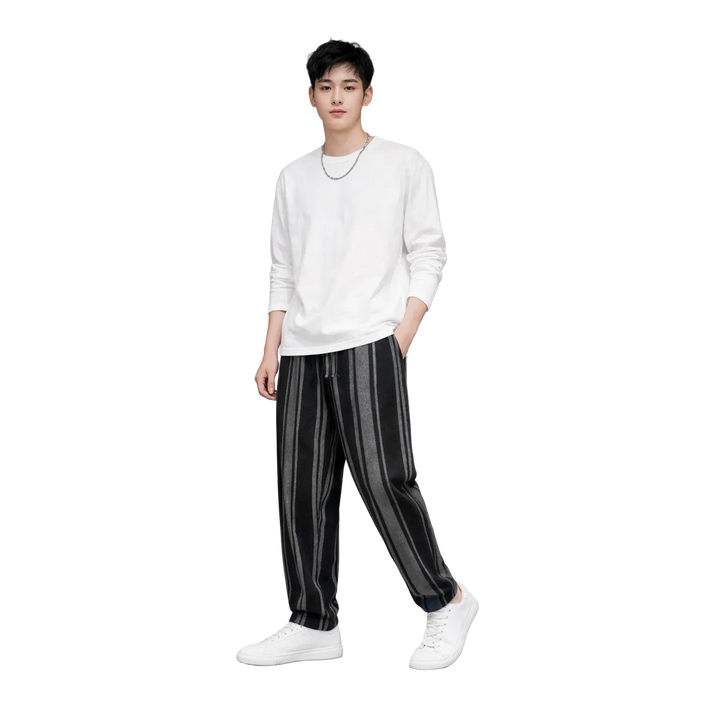Man wearing white long sleeve shirt and black striped pants from Rovelli