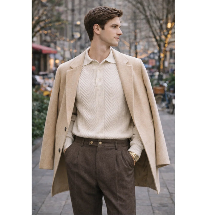 Man in beige coat and knit sweater, brown trousers, street style fashion by Rovelli