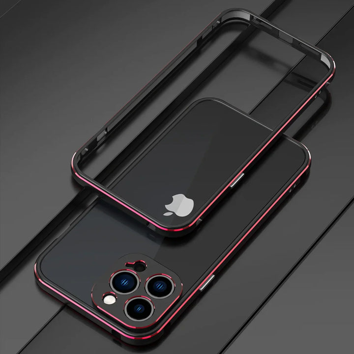 A sleek black smartphone with a triple camera setup and a red-edged durable phone case is placed on a dark, reflective surface. The phone’s Apple logo is visible, and the case, designed for drop protection, is shown partially detached above the phone.