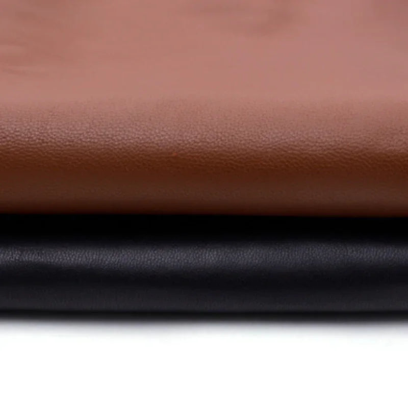 Brown and black genuine leather fabric stacked, Rovelli premium leather material.