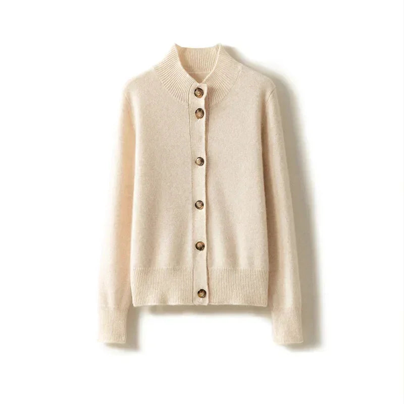 Rovelli cream knit cardigan with button front and ribbed collar on white background