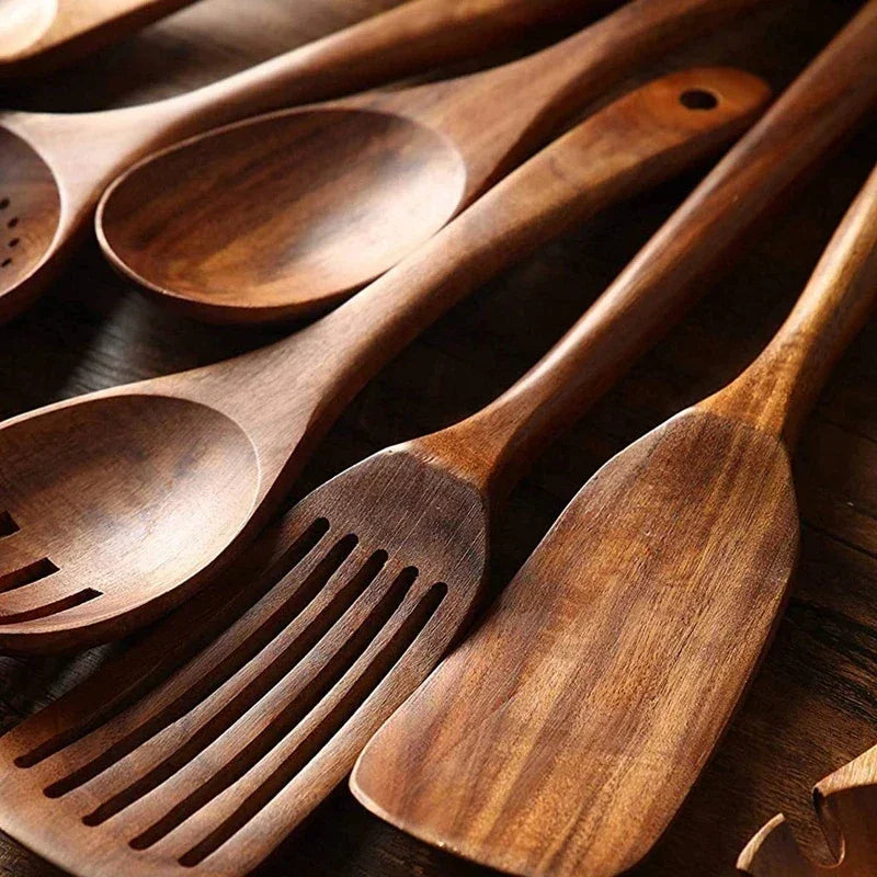Rovelli wooden kitchen utensils set on rustic wood table, natural finish