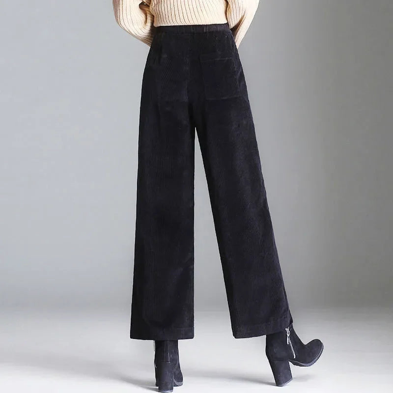 Rovelli wide-leg black corduroy pants with back pocket and heeled boots