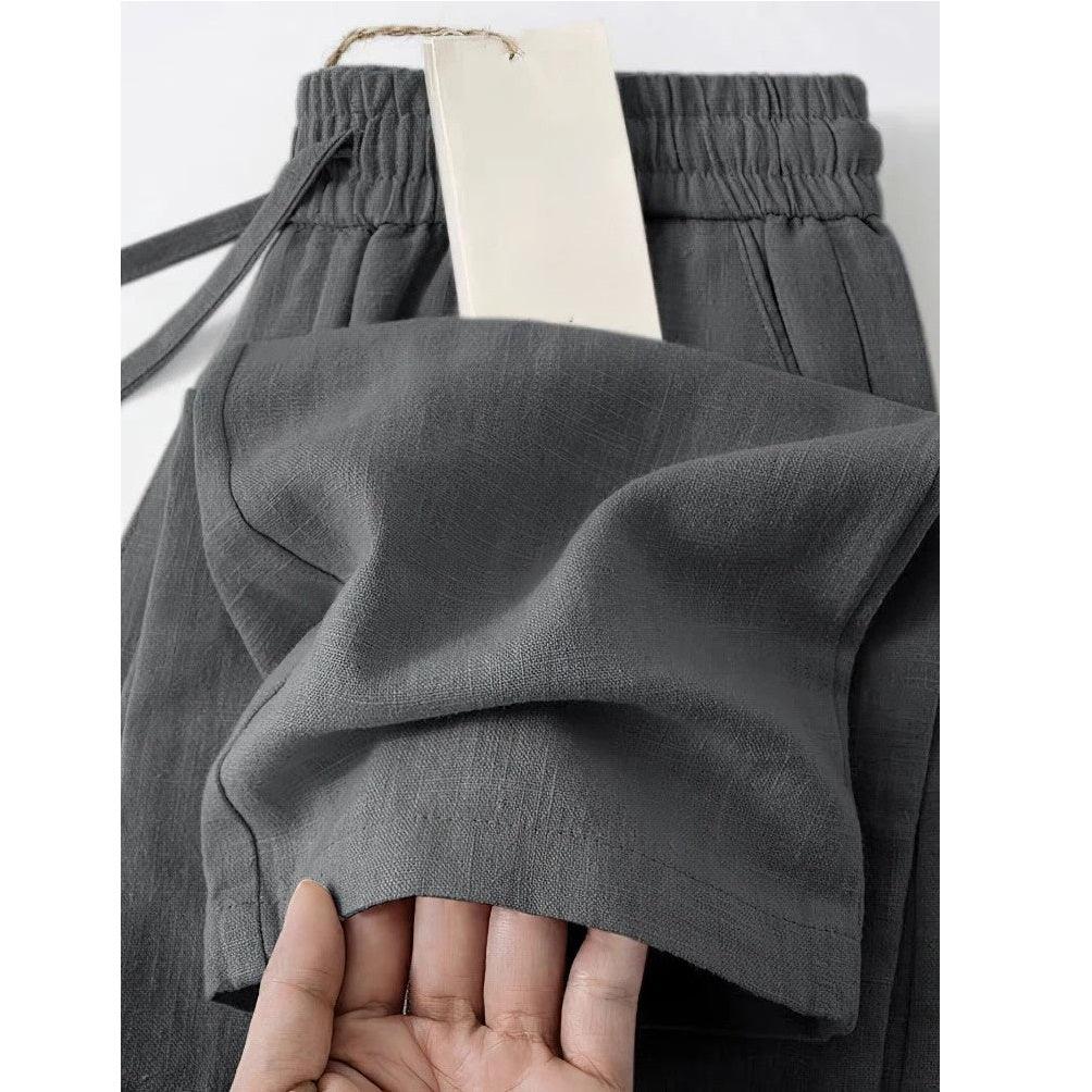 Rovelli dark grey linen pants with elastic waistband and visible front pocket detail