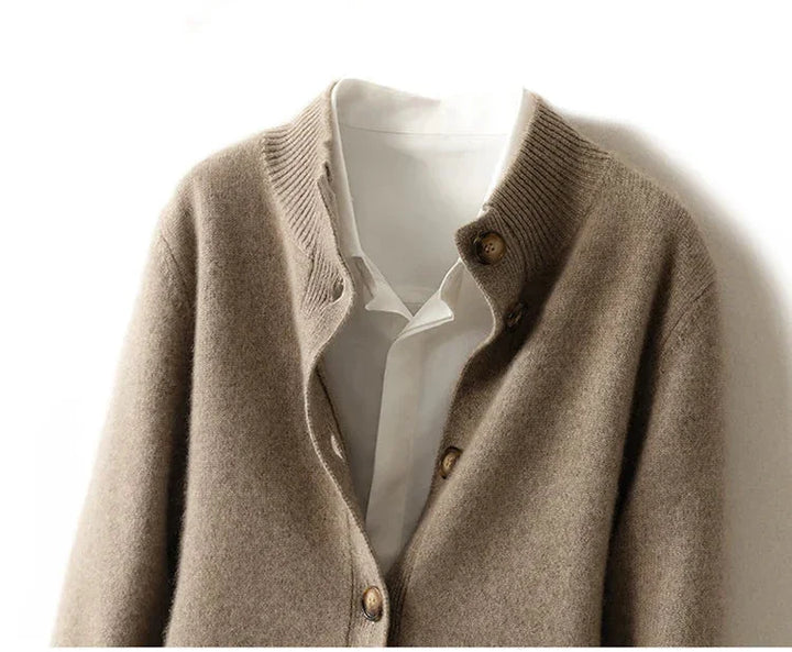 Rovelli beige button-up cardigan layered over white shirt on hanger