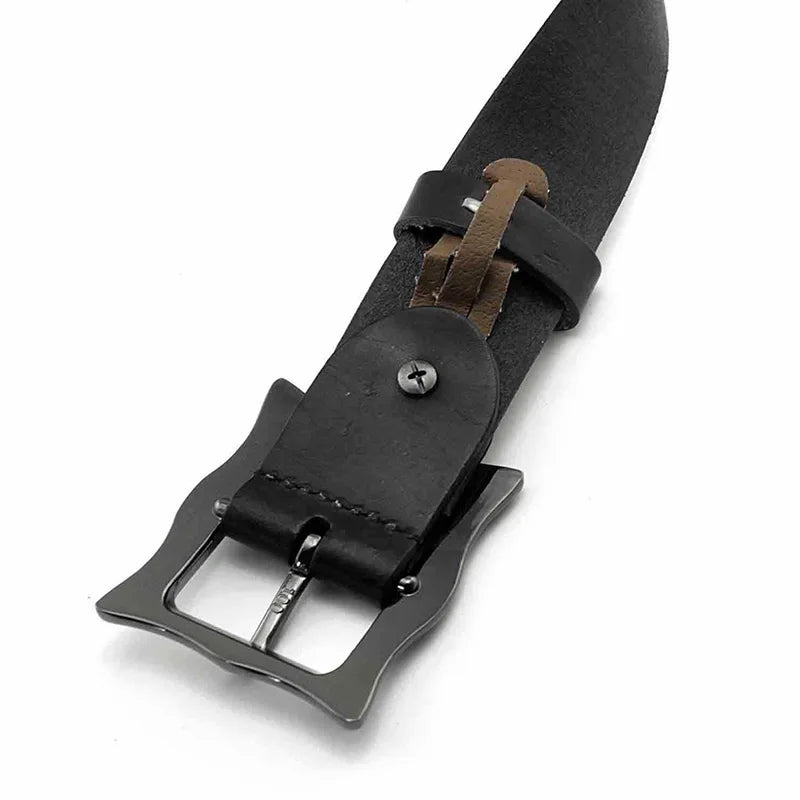 A close-up of a black leather belt with an adjustable buckle featuring a unique, slightly angular design. The belt has brown accent stitching and a metal screw securing the leather near the buckle.