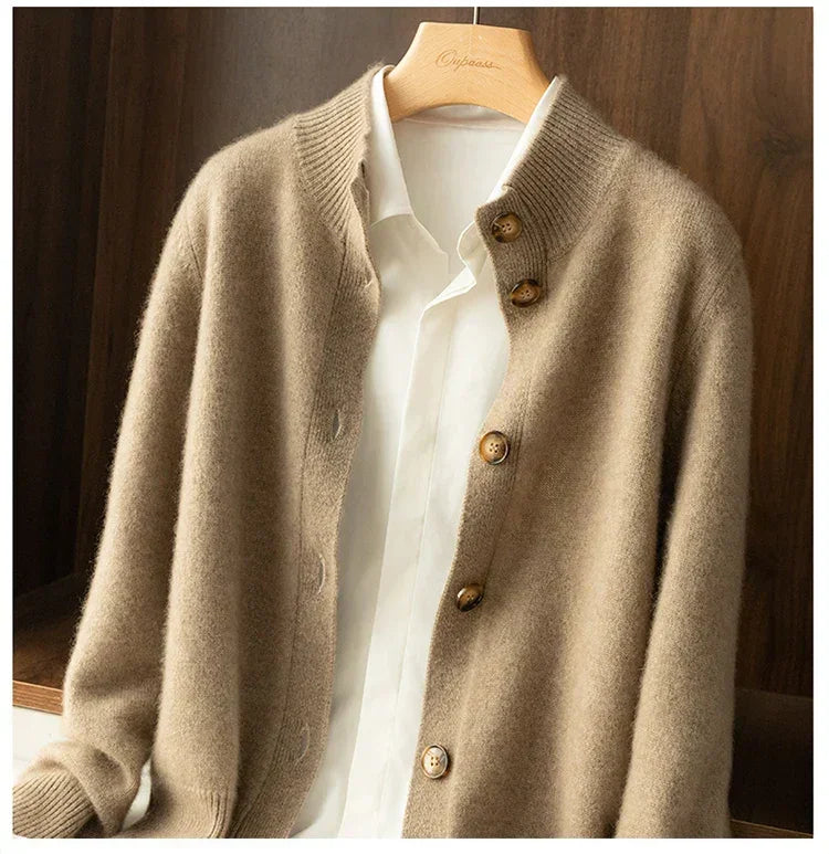 Rovelli beige wool cardigan with buttons over white shirt on wooden hanger
