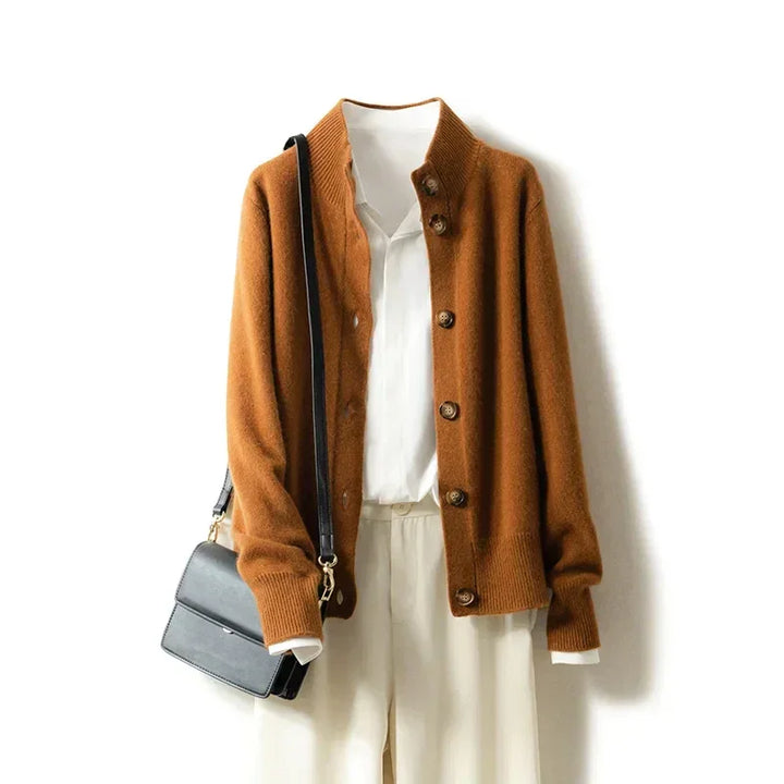 Rovelli brown button-up cardigan over white blouse and pants with black shoulder bag