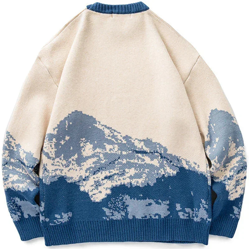 Rovelli beige knit sweater with blue mountain landscape graphic on the back