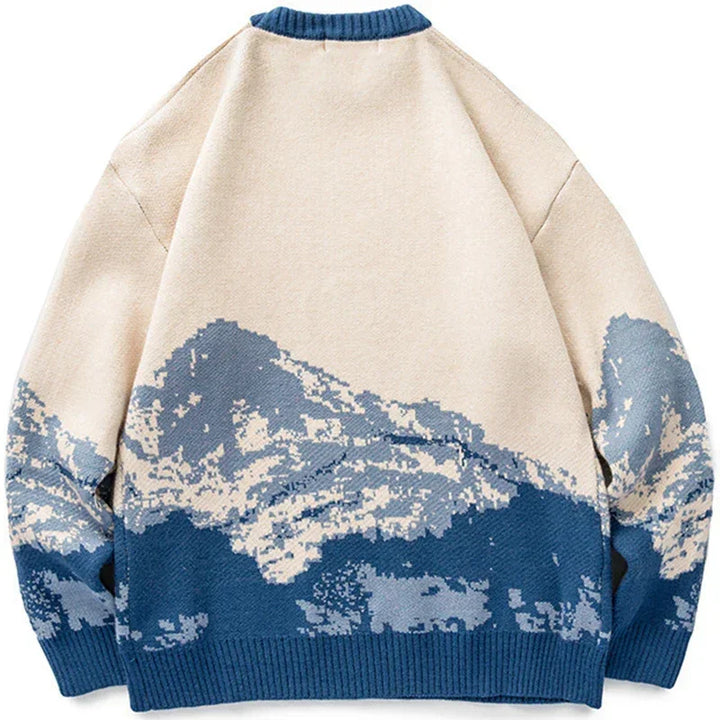 Rovelli beige knit sweater with blue mountain landscape graphic on the back