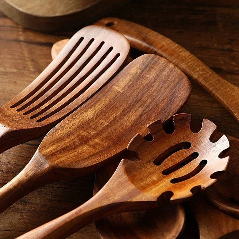 Rovelli wooden kitchen utensils set on rustic wooden table