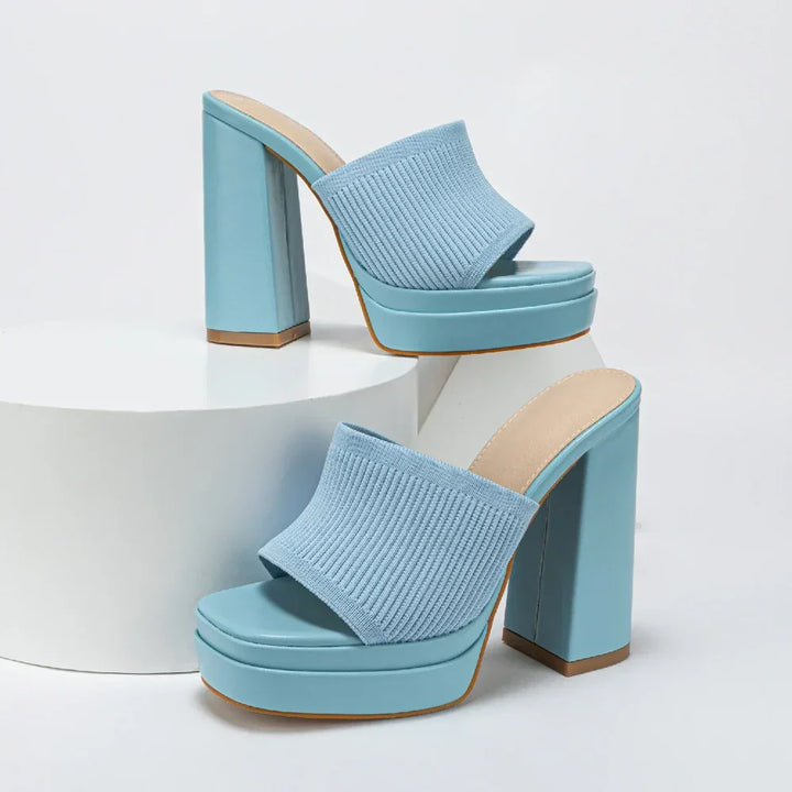 Light blue platform high heel mules with ribbed upper, displayed on a white background at Rovelli