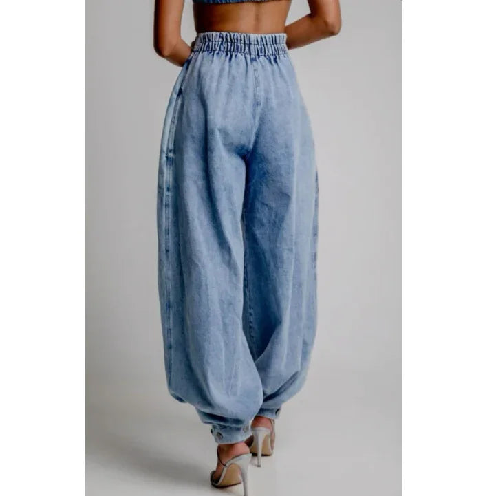 Back view of high waist balloon jeans in light blue denim from Rovelli