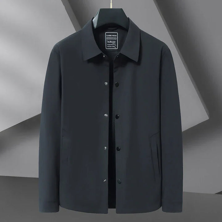 Rovelli men's black minimalist button-up jacket on hanger, modern background