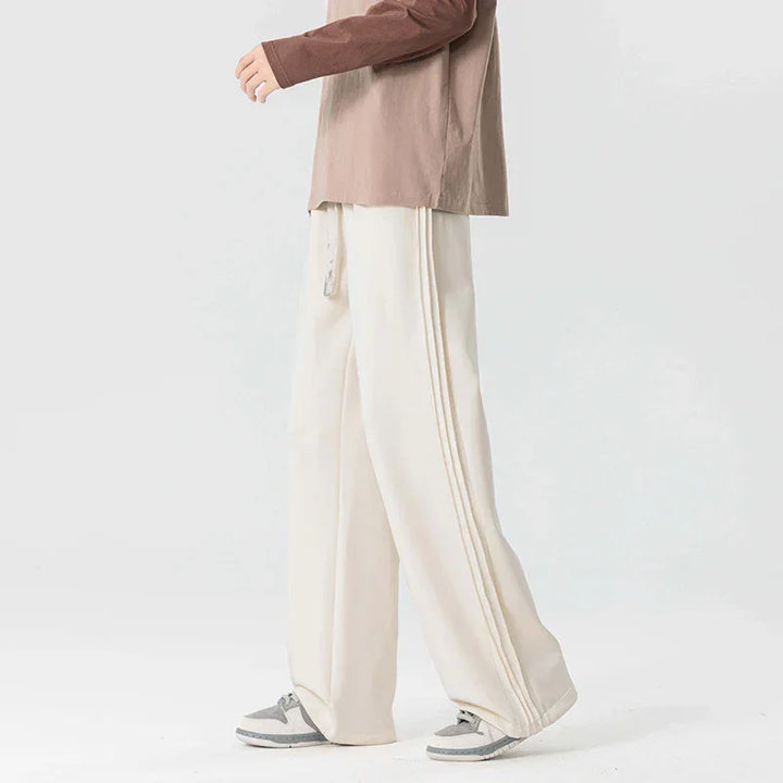 Rovelli wide-leg cream pants with side stripes and drawstring, casual streetwear style