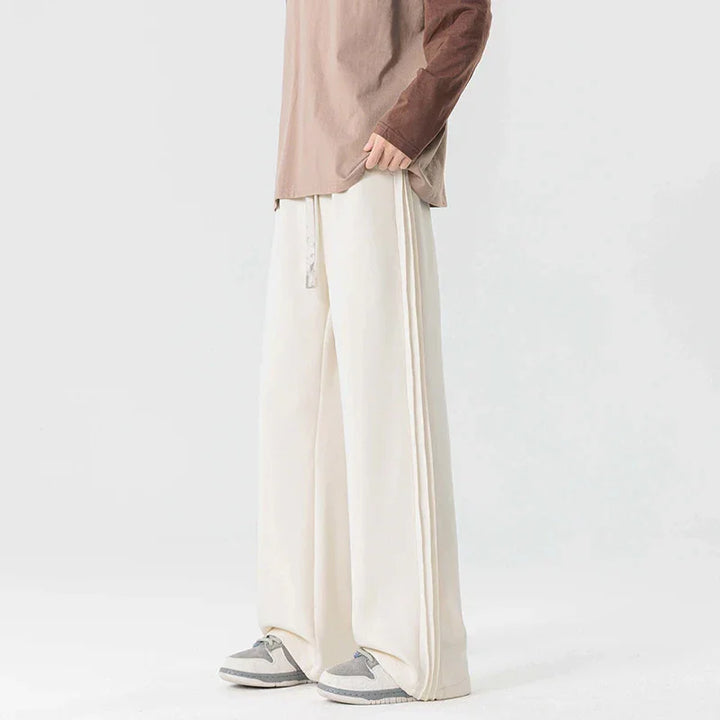 Rovelli wide leg cream pants with drawstring, styled with sneakers