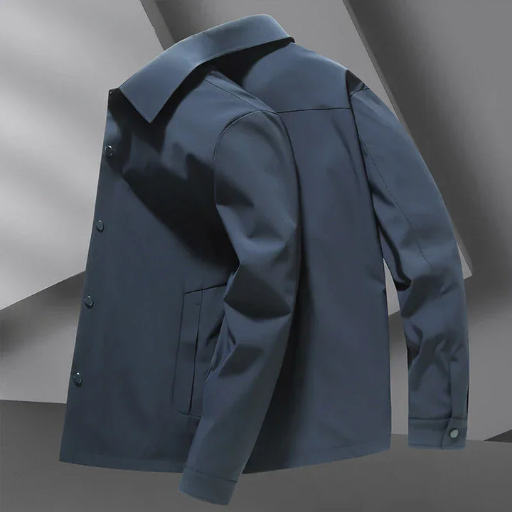 Rovelli dark blue modern men's jacket with button closure and pockets on geometric background