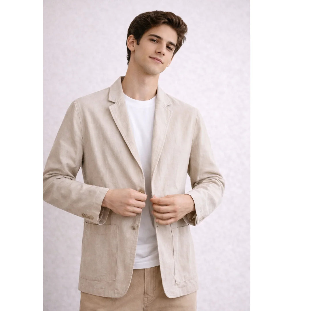 Man wearing beige Rovelli summer blazer over white shirt, casual fashion style