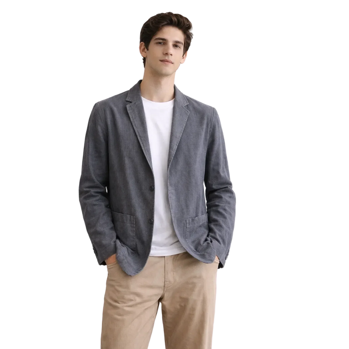 Man wearing Rovelli gray summer blazer with white shirt and beige pants on black background