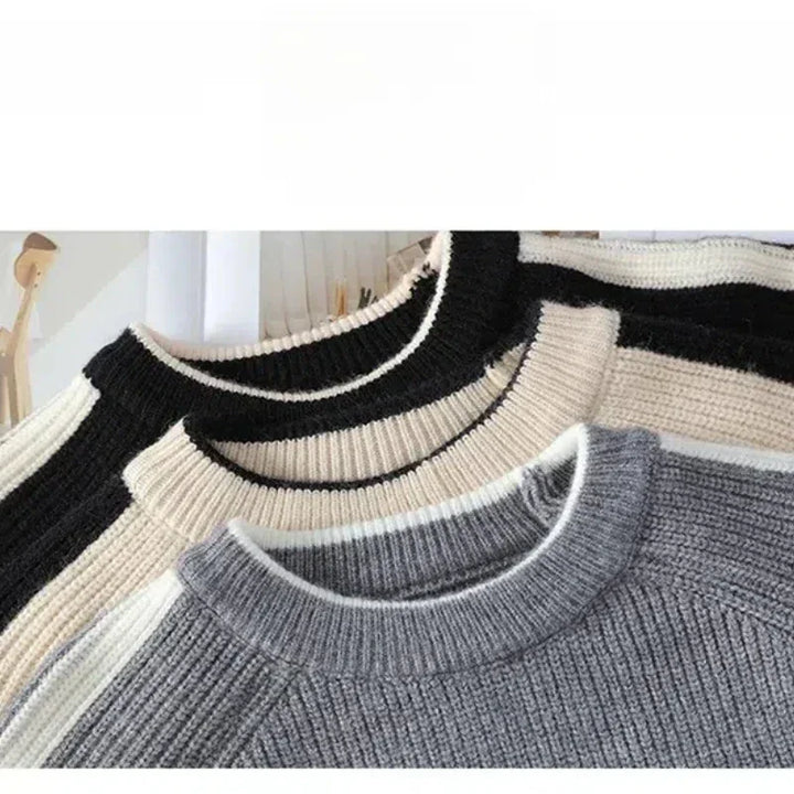 Rovelli ribbed knit crew neck sweaters in black, beige, and gray on hangers