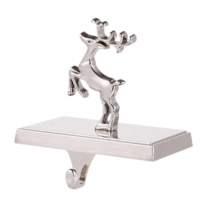Silver reindeer stocking holder on white background, decorative Rovelli holiday decor