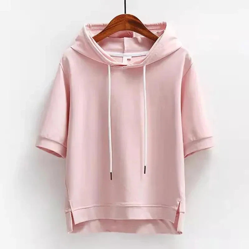 Light pink short sleeve hoodie with drawstrings on wooden hanger, Rovelli fashion