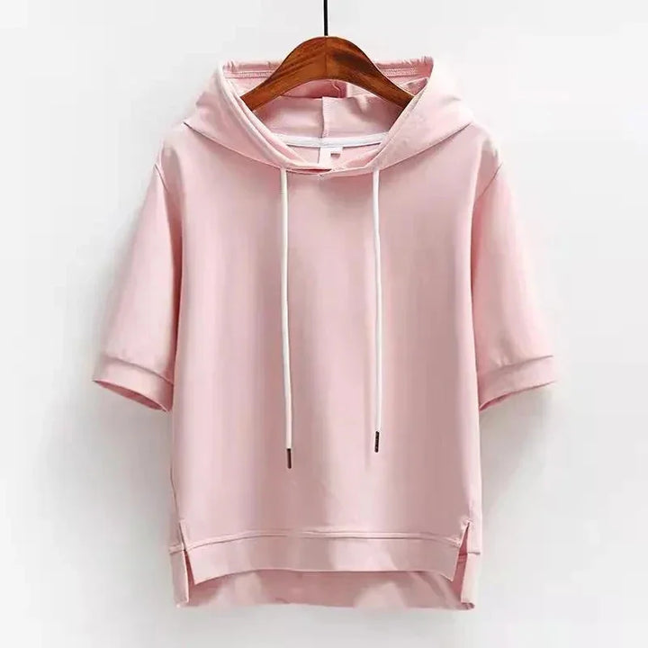 Light pink short sleeve hoodie with drawstrings on wooden hanger, Rovelli fashion