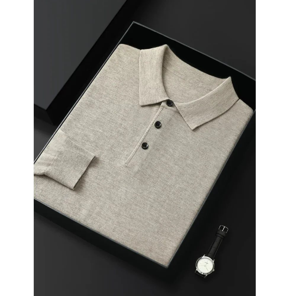 Rovelli beige polo shirt neatly folded in black box, black leather watch beside it