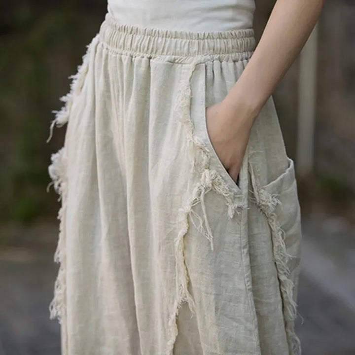 Rovelli beige frayed linen skirt with elastic waistband and side pockets, casual style