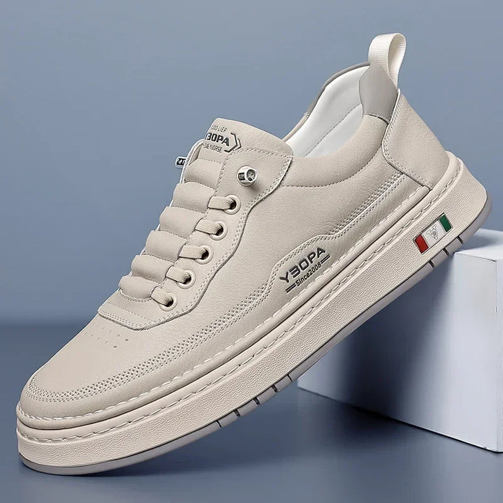 Rovelli beige casual sneaker with textured sole and Italian flag accent on side