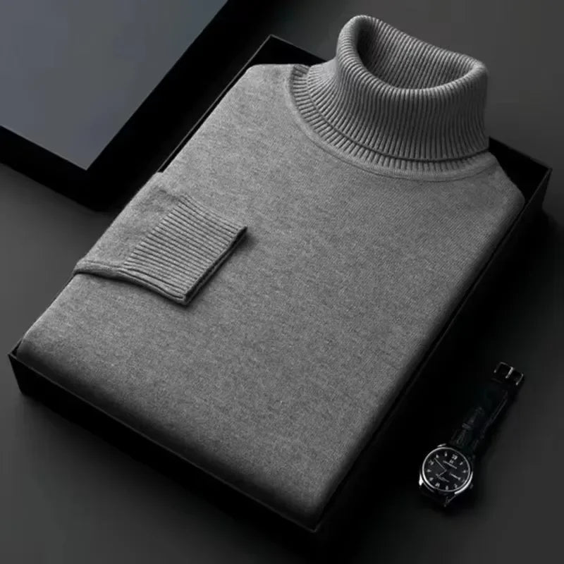 Folded grey turtleneck sweater in box, minimalist style, Rovelli fashion accessory watch