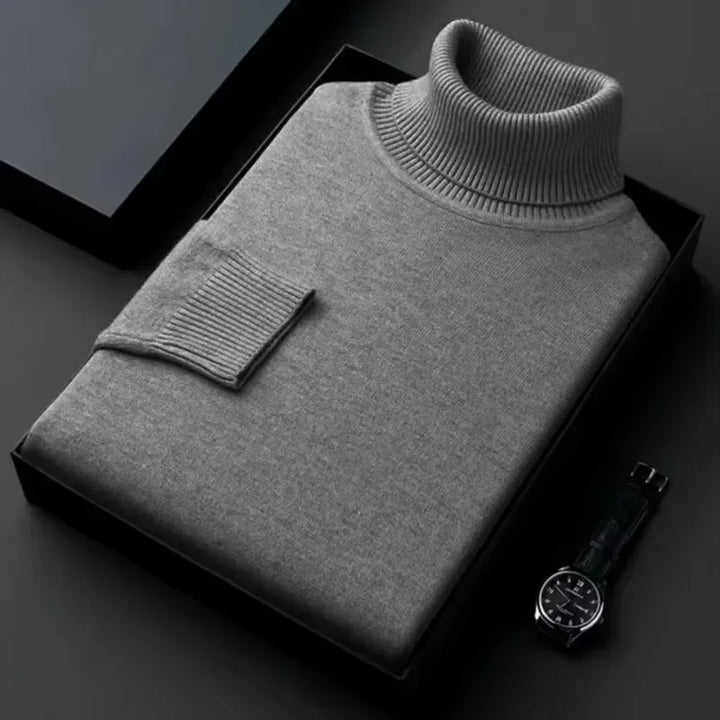 Folded grey turtleneck sweater in box, minimalist style, Rovelli fashion accessory watch