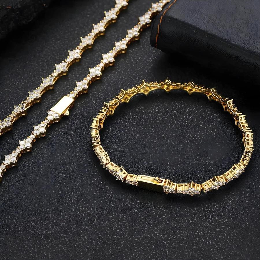 Rovelli gold tennis bracelets with sparkling diamonds on black textured surface