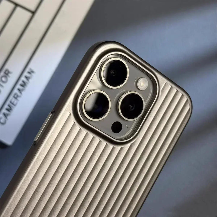 Rovelli metallic striped phone case on smartphone with triple camera, close-up view