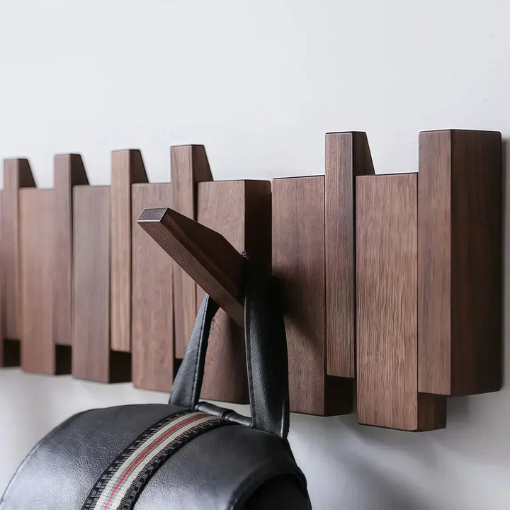 Modern wooden wall hook rack with a black bag hanging, Rovelli home decor